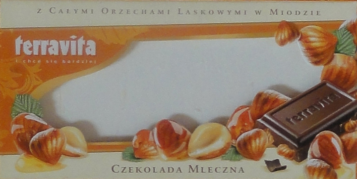 Terravita male poziom czekolada mleczna z calymi orzechami laskowymi w miodzie.jpg